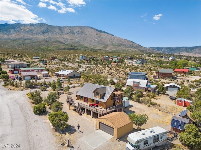 drone / aerial view featuring a mountain view