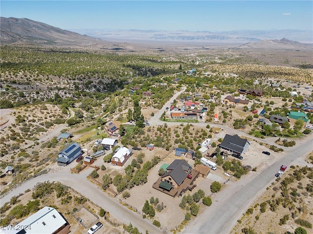 bird's eye view with a mountain view