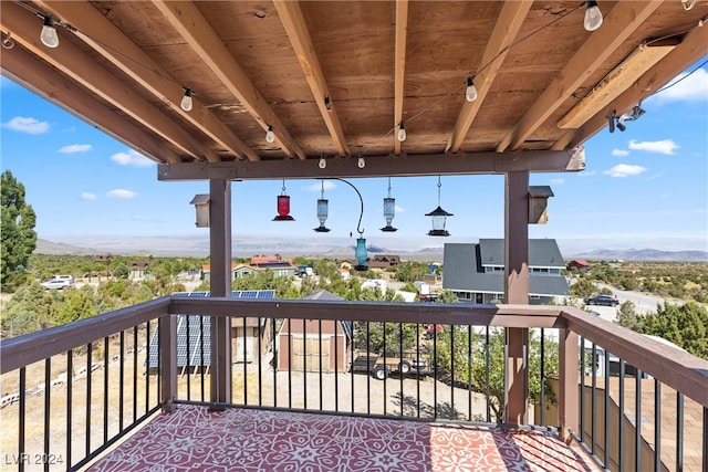 wooden terrace with a mountain view