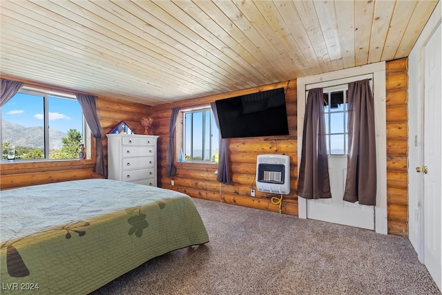 bedroom featuring rustic walls, heating unit, wood ceiling, a mountain view, and carpet floors