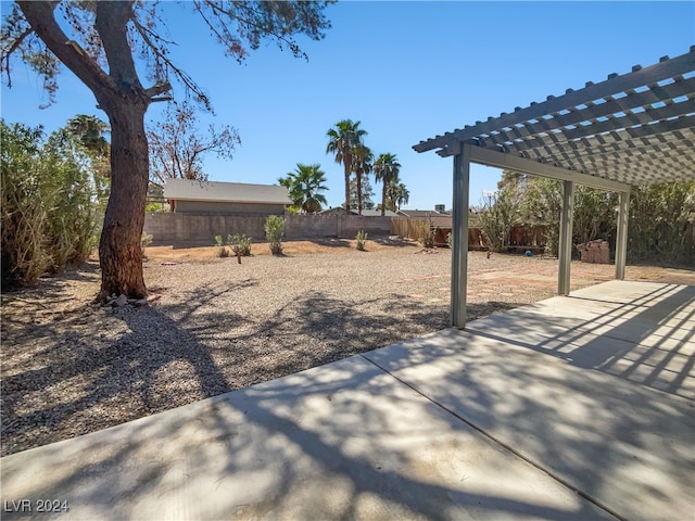 view of yard featuring a patio area and a pergola