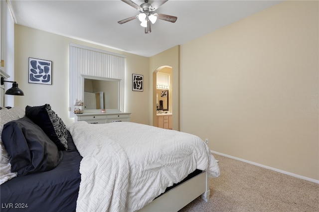 bedroom featuring light carpet and ceiling fan