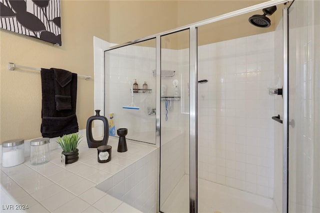 bathroom featuring a shower stall