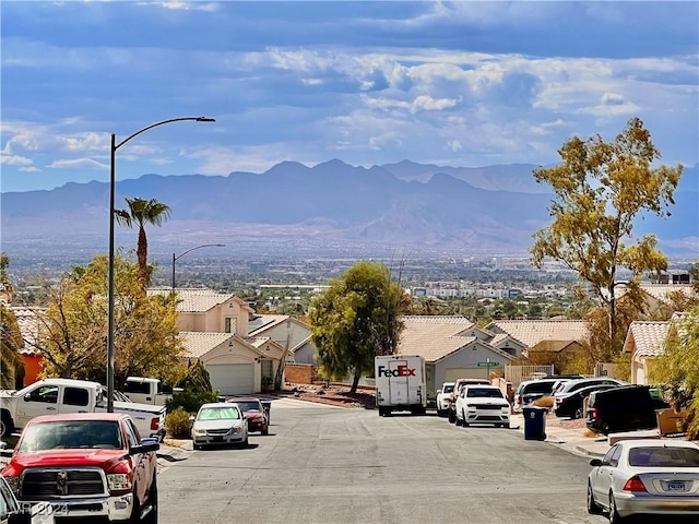 property view of mountains with a residential view