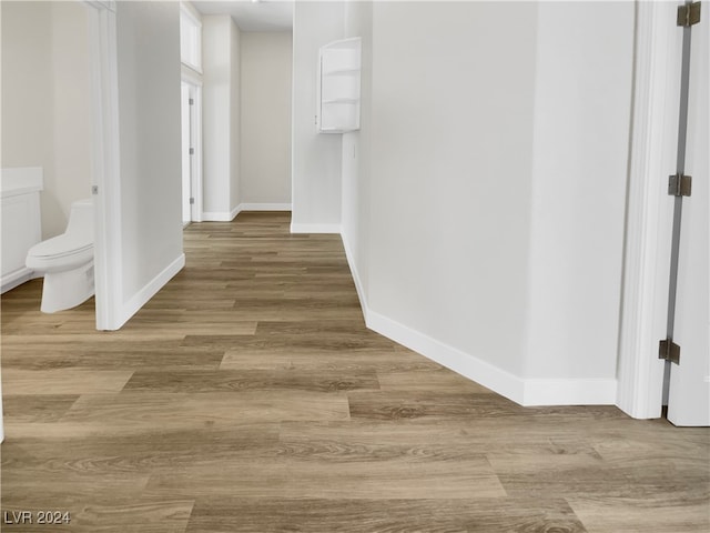 hall featuring hardwood / wood-style flooring