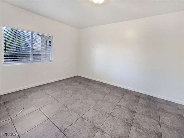 view of tiled spare room