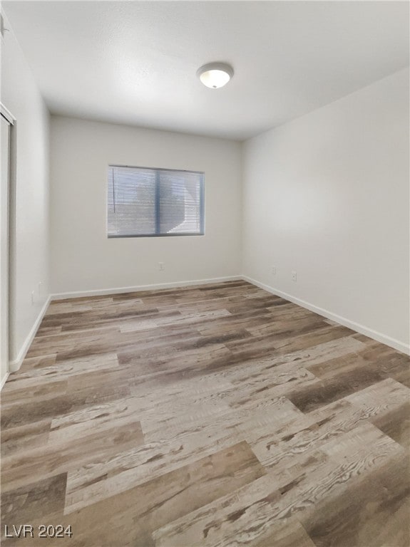 unfurnished room featuring light hardwood / wood-style flooring