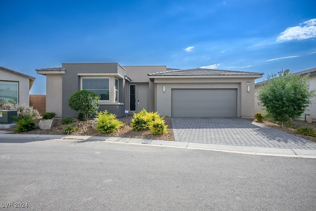 ranch-style home with a garage