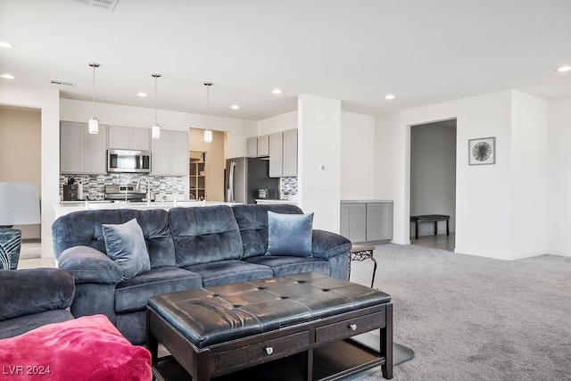 living room featuring light colored carpet