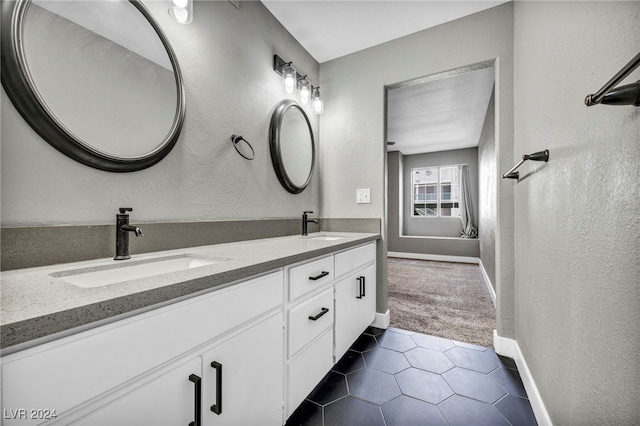 bathroom with vanity and tile patterned floors