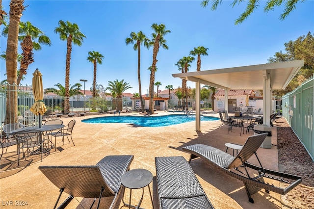 view of pool featuring a patio area