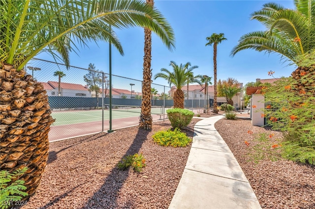 surrounding community with tennis court