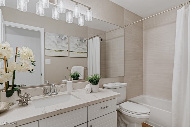 full bathroom featuring vanity, toilet, and shower / bath combo with shower curtain