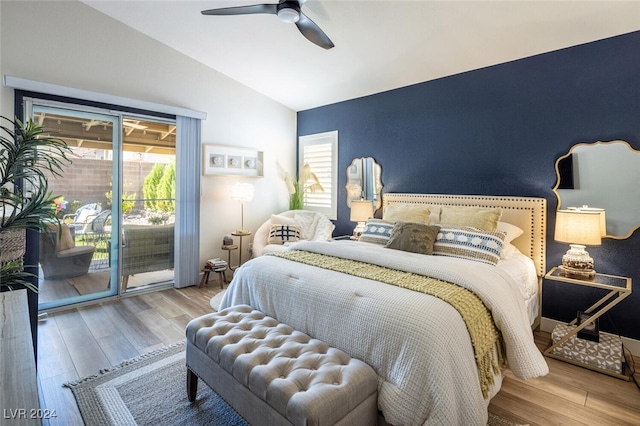 bedroom featuring lofted ceiling, light hardwood / wood-style floors, ceiling fan, and access to exterior