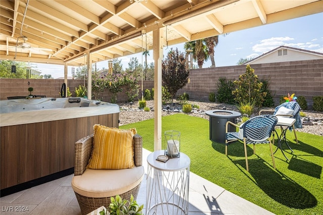 view of patio / terrace featuring a hot tub