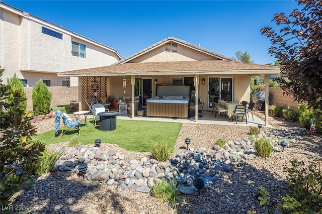 rear view of property with a patio area