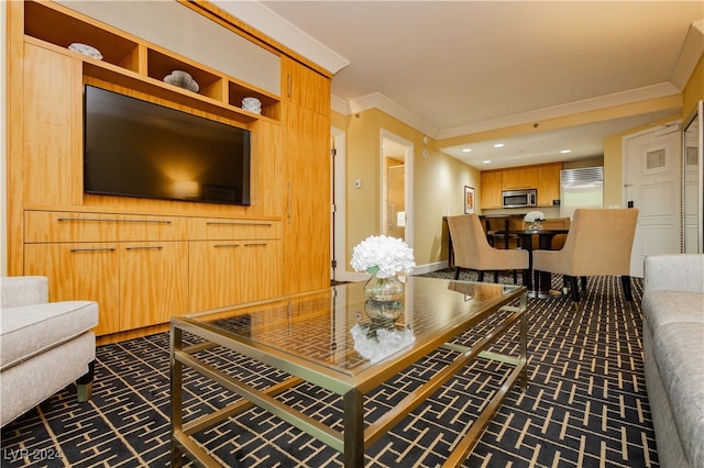 living room with dark colored carpet and ornamental molding