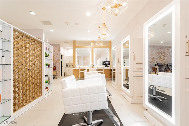 interior space with light tile patterned floors and a notable chandelier