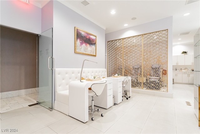 bathroom with an enclosed shower and vanity