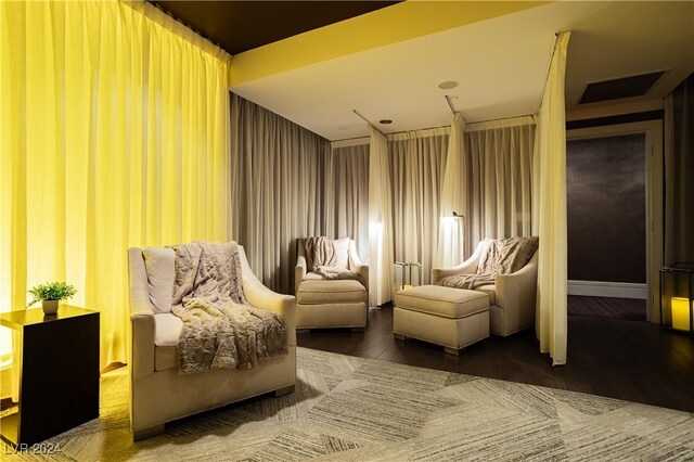 sitting room featuring hardwood / wood-style flooring