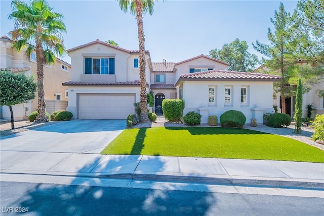 mediterranean / spanish-style home featuring a garage