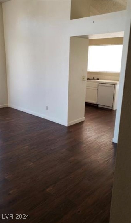 unfurnished room featuring dark hardwood / wood-style floors