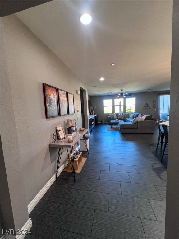 corridor featuring dark hardwood / wood-style flooring