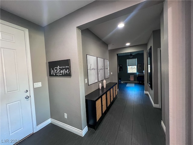 hall with dark hardwood / wood-style floors