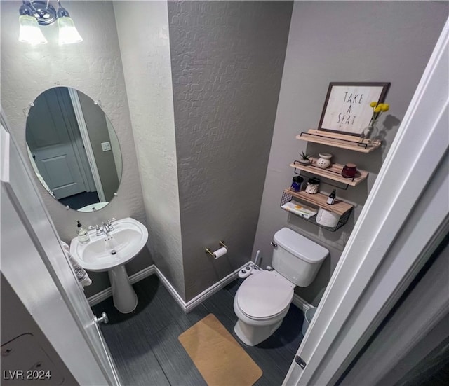 bathroom featuring toilet