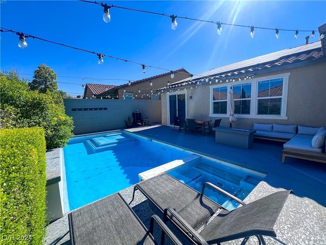 view of swimming pool with an outdoor hangout area and a patio area