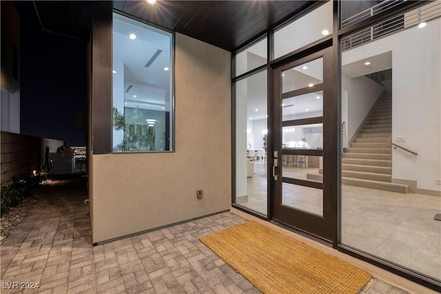 interior space featuring brick floor and stairs