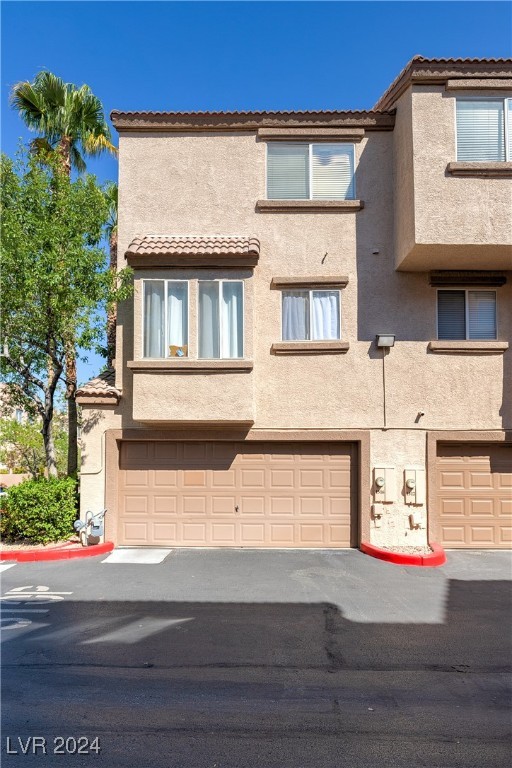 view of property with a garage