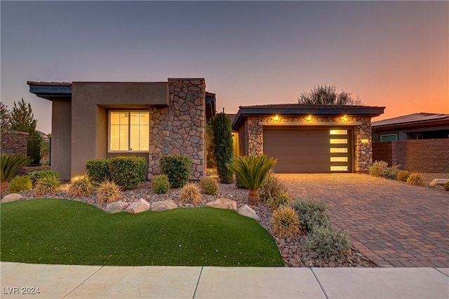 view of front of home with a garage