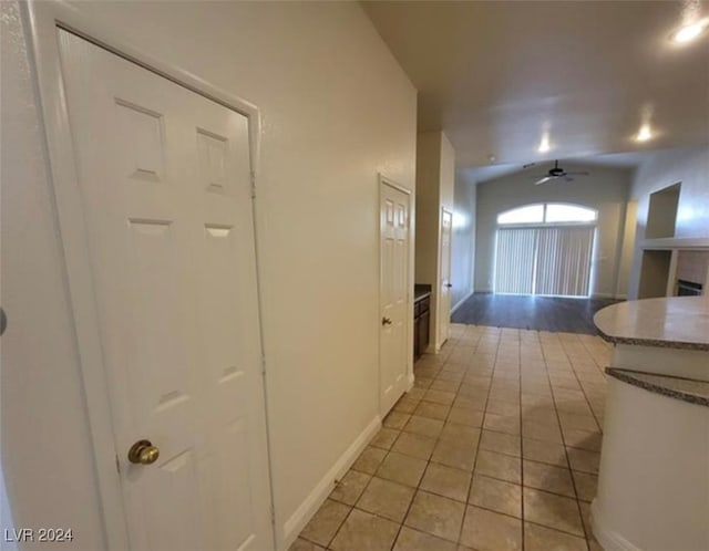 corridor with light tile patterned floors