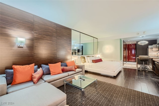 bedroom featuring dark hardwood / wood-style flooring