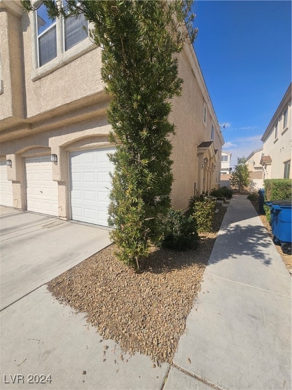 view of home's exterior with a garage