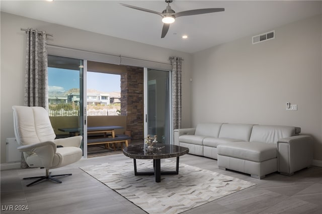 living room featuring ceiling fan