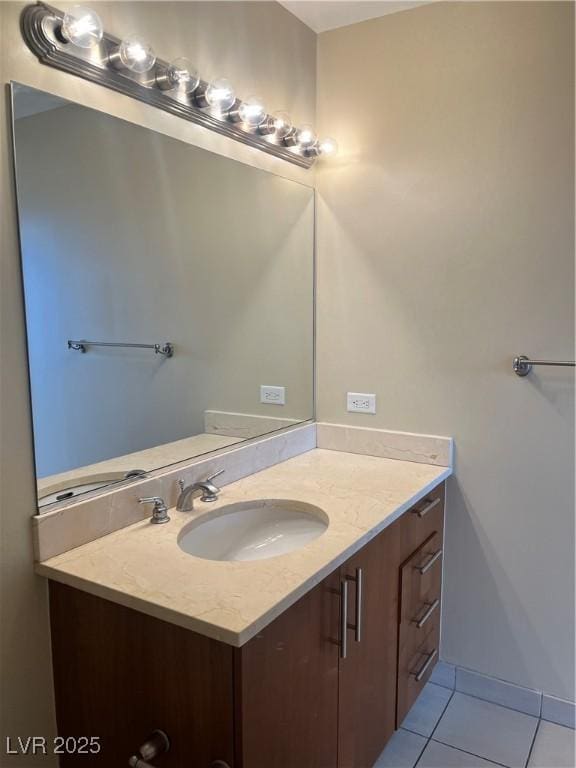 bathroom with vanity and tile patterned floors