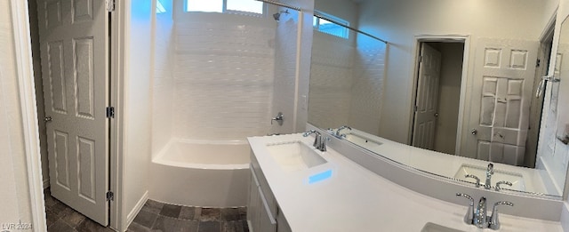 bathroom featuring vanity, wood-type flooring, and bathtub / shower combination