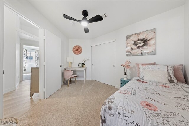 bedroom featuring ceiling fan and light hardwood / wood-style floors