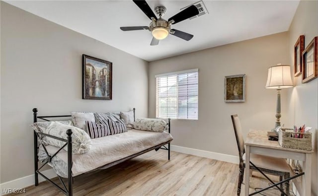 interior space with ceiling fan and light hardwood / wood-style flooring