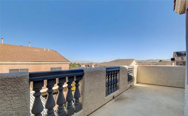 view of patio with a balcony