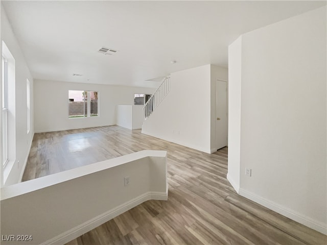 unfurnished room with light hardwood / wood-style floors