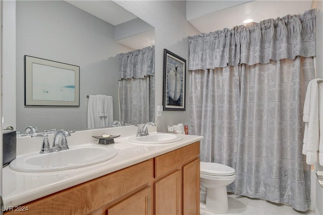 full bath featuring double vanity, toilet, a shower with curtain, and a sink