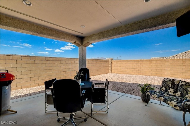 view of patio / terrace with a fenced backyard and outdoor dining space