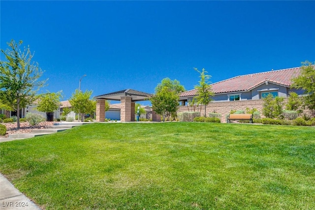 view of front of property with a front lawn