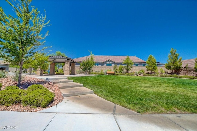 view of front of house with a front lawn