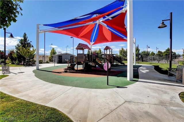 community jungle gym with fence