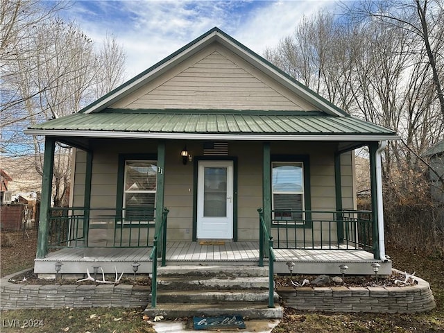 bungalow-style house featuring covered porch