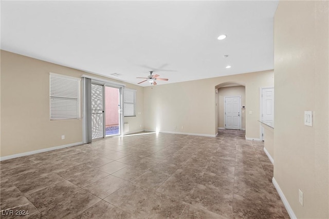 spare room featuring ceiling fan